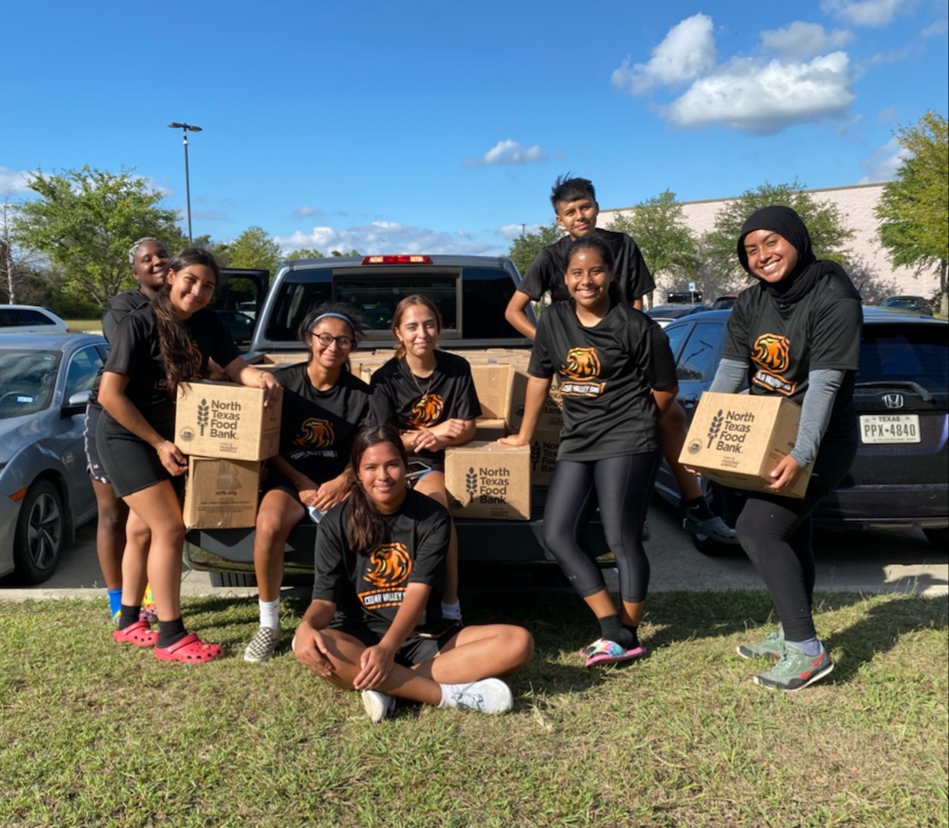Suns Women's Soccer Team Serve the Community